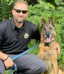 Rex K9 with owner Malinois